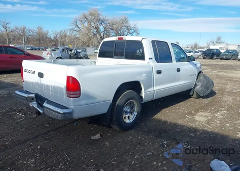2001 Dodge Dakota Slt/Sport from USA, damaged, VIN 1B7GL2AN11S140396